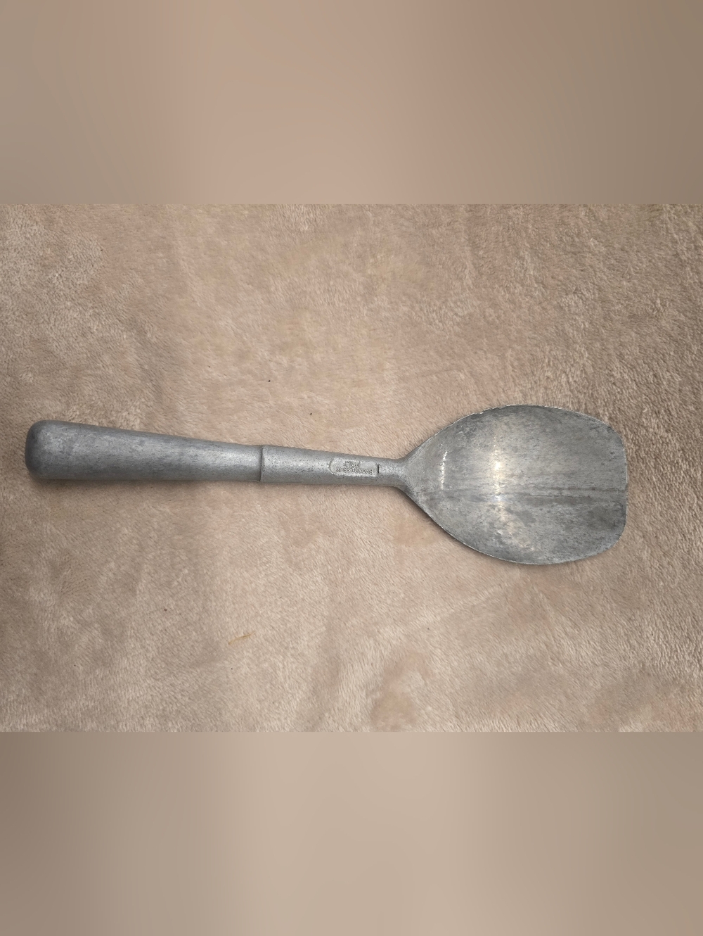 Vintage cast aluminum paddle, manufactured by Progressus, Italy